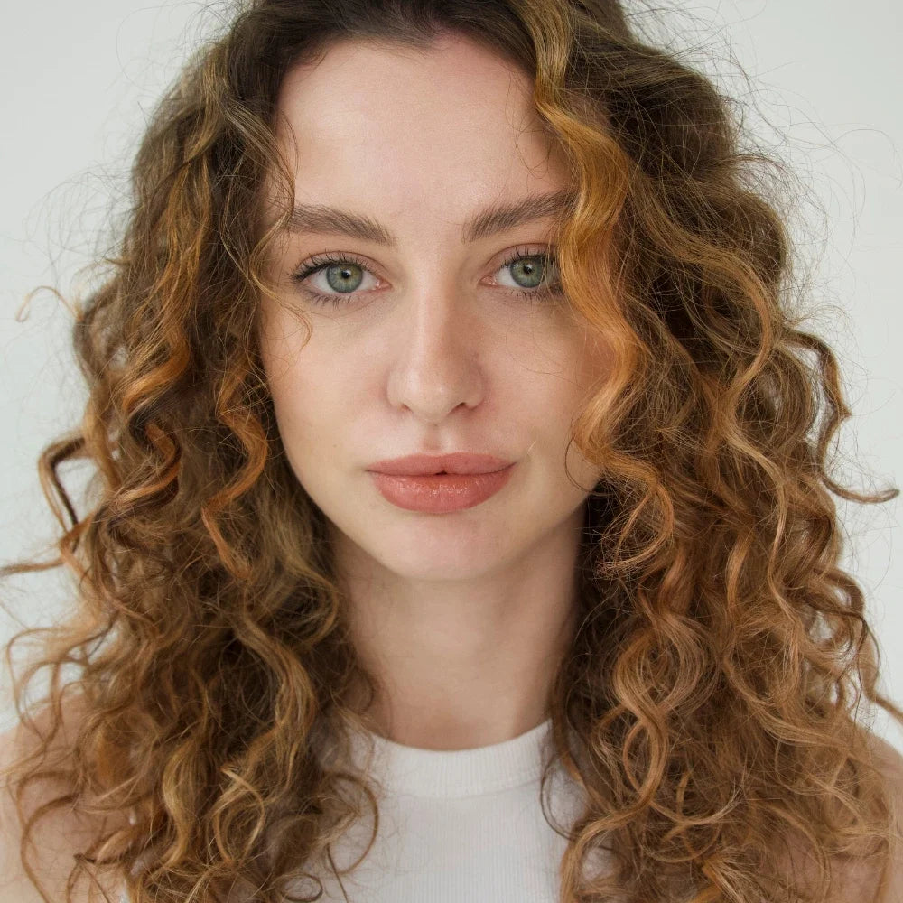 Woman with Blonde Curly Hair