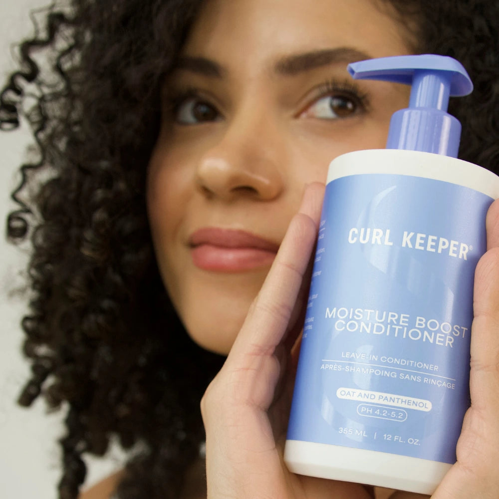 CurlKeeper_-_Leave-InConditioner_-_MoistureBoostConditioner_-_12oz_-_Lifestyle3A.webp