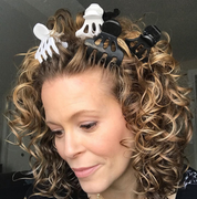 Woman using Roller Jaw Clamps for volume
